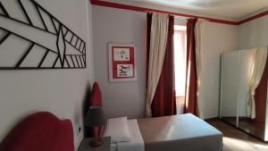 Postel nebo postele na pokoji v ubytování Albergo Moderno