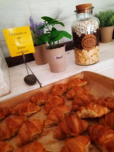 a tray of croissants sitting on a table with at Hotel Riviera in Mamaia