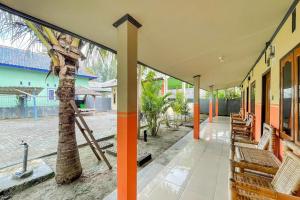 Zahrada ubytování Ekas Beach Guesthouse Mitra RedDoorz