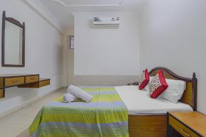 Säng eller sängar i ett rum på Hotel Siddharth