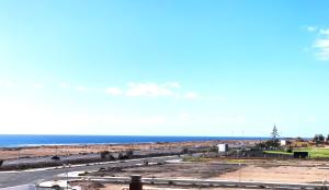 a view of the ocean from the balcony of a condo at Top Marina Powered by SolymarCalma in Costa de Antigua