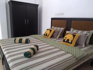 Postel nebo postele na pokoji v ubytování Kismet Rest Mirissa