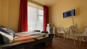 TV a/nebo společenská místnost v ubytování AFRODITA I 108 Studio Sunny Beach