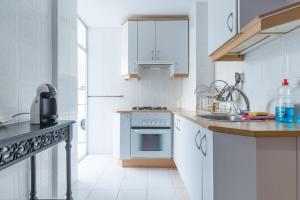 A kitchen or kitchenette at Rooms Salomons by easyBNB Még 19 kép