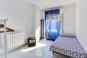 A bed or beds in a room at Rooms Salomons by easyBNB