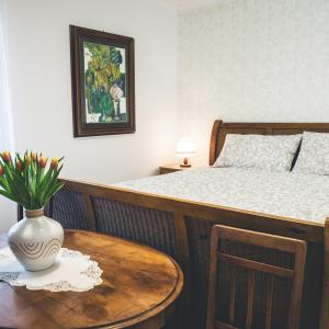 Postel nebo postele na pokoji v ubytování Apartmaji Aucin - Brda