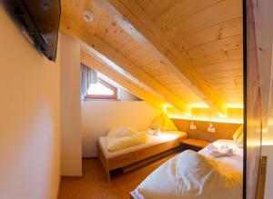 Postel nebo postele na pokoji v ubytování Hotel Schiederhof