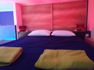 Postel nebo postele na pokoji v ubytování Apartman Hadar