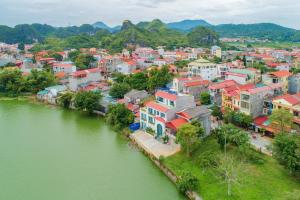 an aerial view of a town next to a river at WHITE HOTEL in Lạng Sơn