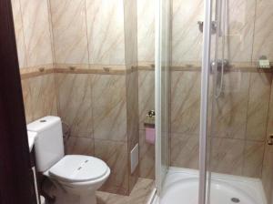 Koupelna v ubytování Hotel Royal 2