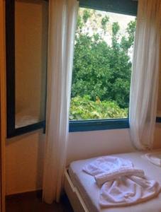 Posteľ alebo postele v izbe v ubytovaní Sofia Rooms