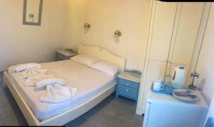 Posteľ alebo postele v izbe v ubytovaní Sofia Rooms