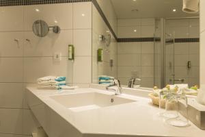Koupelna v ubytování Aribo Hotel