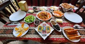a table topped with plates of food on a table at Ali Baba's House in Selçuk