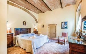 Posteľ alebo postele v izbe v ubytovaní Agriturismo Fattoria Il Piano - Appartamento Stalla - San Gimignano