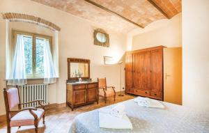 Posteľ alebo postele v izbe v ubytovaní Agriturismo Fattoria Il Piano - Appartamento Stalla - San Gimignano