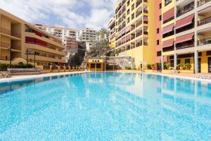 Basen w obiekcie OLIVIA SUNSET Perfect Stay by Sunkeyrents lub w pobliżu