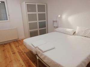 Łóżko lub łóżka w pokoju w obiekcie Calle Carmen Céntrico Amplio