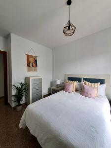 Posteľ alebo postele v izbe v ubytovaní Apartamento Centro Peña de los Enamorados