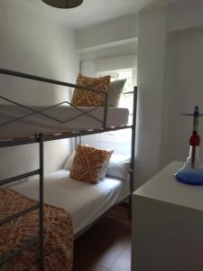 A bed or beds in a room at Santa Justa