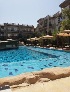 Piscina a 1 Bedroom Appartment B109 in Jungle Club House Hurghada o a prop