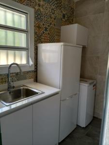 Kuchyň nebo kuchyňský kout v ubytování Casa unifamiliar en Calafell