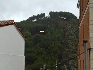 a mountain with two lights on top of it at APARTAMENTO MARRODAN CENTRICO in Arnedillo