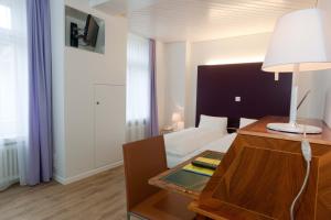 Voodi või voodid majutusasutuse Hotel Vadian Garni toas