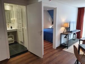 Postel nebo postele na pokoji v ubytování Badhotel Bruin