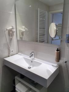 Koupelna v ubytování Badhotel Bruin