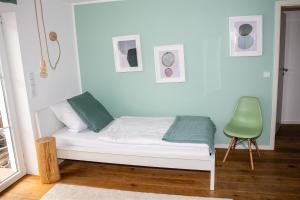 
Ein Bett oder Betten in einem Zimmer der Unterkunft Peterlhaus

