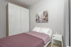 Posteľ alebo postele v izbe v ubytovaní Warsaw City Comfort Apartments