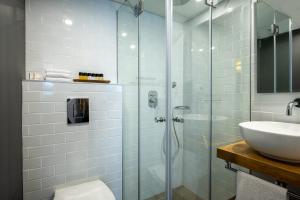 Koupelna v ubytování Prima City Hotel