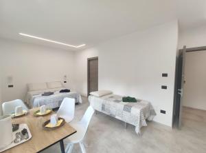 Letto o letti in una camera di A, C or D - MyAostaProject Rentals