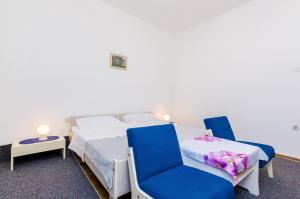 Postel nebo postele na pokoji v ubytování Apartment Lucy