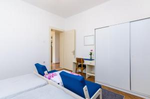 Postel nebo postele na pokoji v ubytování Apartment Lucy