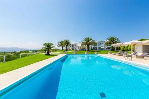 a swimming pool in a villa with a resort at Casa Scordilli in Chania Town