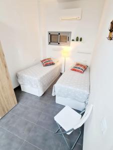 Ein Bett oder Betten in einem Zimmer der Unterkunft Casa Sabino
