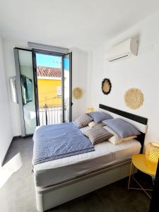 Ein Bett oder Betten in einem Zimmer der Unterkunft Casa Sabino