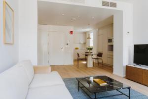 Telewizja i/lub zestaw kina domowego w obiekcie The Passage Apartments