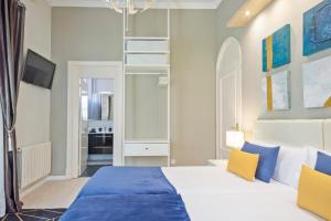 
Cama o camas de una habitación en Villa Victoria Barcelona
