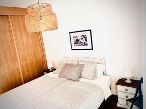 Ein Bett oder Betten in einem Zimmer der Unterkunft Alegranza, apartamento de 3 habitaciones en Lanzarote
