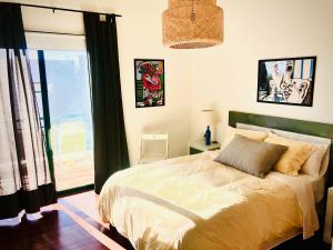 Ein Bett oder Betten in einem Zimmer der Unterkunft Alegranza, apartamento de 3 habitaciones en Lanzarote