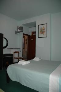 Ein Bett oder Betten in einem Zimmer der Unterkunft Hotel Ristorante Verna