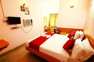 Postelja oz. postelje v sobi nastanitve Hotel Kirthikaa Palace Salem