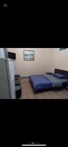 Voodi või voodid majutusasutuse Arm Hotel toas
