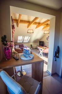 Televízia a/alebo spoločenská miestnosť v ubytovaní Apartament SWEET Ustroń