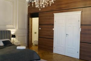Posteľ alebo postele v izbe v ubytovaní Prestige Apartment Rynek Kielce