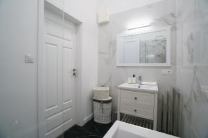 Kúpeľňa v ubytovaní Prestige Apartment Rynek Kielce