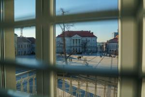 a view of a city from a window at Prestige Apartment Rynek Kielce in Kielce